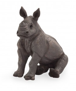Animal Planet rhino cub sitting 387257